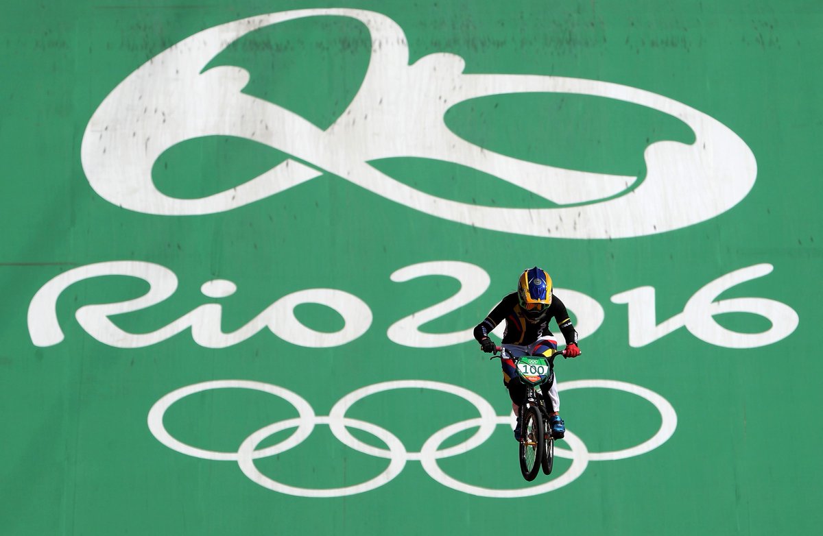 Olympics's tweet photo. .@marianapajon (#COL) wins #gold in women's #CyclingBMX ! She becomes the 1st female BMX athlete to win 2! #Olympics https://t.co/ZwcwQEKFci
