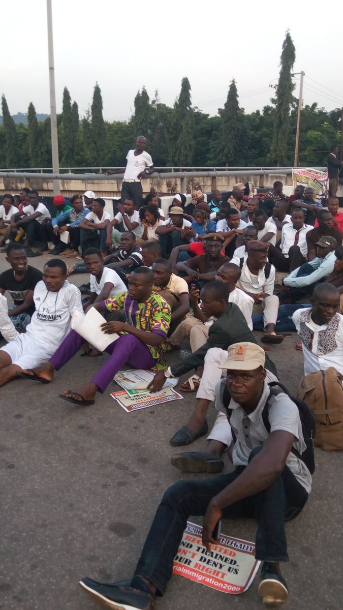 obyezeks's tweet photo. Earlier today, I rode past the turn into the Villa at 3 Arms Zone & saw crowd of #NigeriaImmigration2000 Protesters https://t.co/noxJQ2O9Tk
