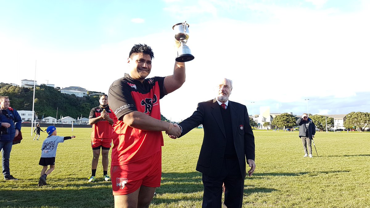PonekeRuffnuts's tweet photo. @PonekeFC Ruffnuts Captain Peti Keni recieves the John Davis Trophy from John Davis himself. #YouBelong https://t.co/XiGKBqxwif