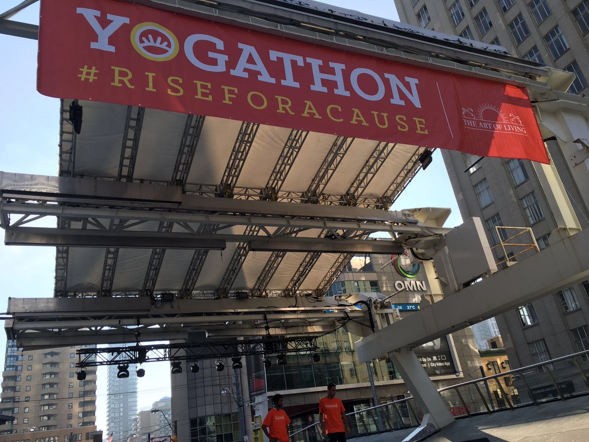 idayofyogacan's tweet photo. @YogathonToronto 108 Sun Salutations about to bit at young and Dundas Square. @YDSquare @Kathleen_Wynne https://t.co/2bu2B0Eckd