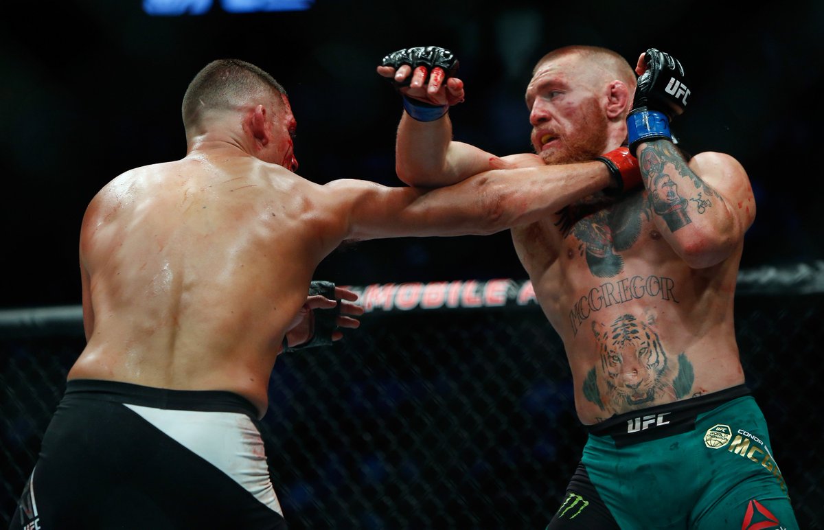 SkySports's tweet image. REVENGE! #ConorMcGregor defeats #NateDiaz in #UFC202 rematch. Full story: skysports.tv/O9vX6Z