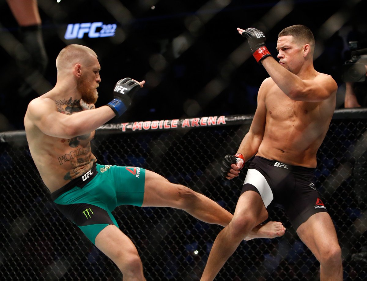 SkySports's tweet image. REVENGE! #ConorMcGregor defeats #NateDiaz in #UFC202 rematch. Full story: skysports.tv/O9vX6Z