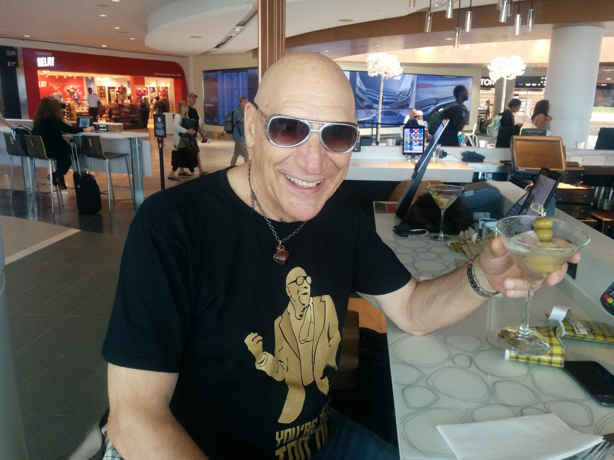 HanztheManz's tweet photo. Martini in hand Mr. Bob is ready for Finland #AirGuitarCanada #AGWC #MrBob #HereWeGo https://t.co/bh9PtgEhOE