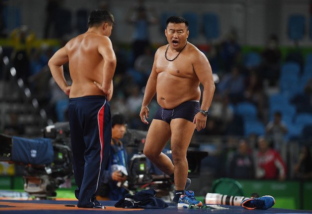 BleacherReport's tweet photo. Mongolia’s wrestling coaches weren’t happy with judges’ decision…so they protested by stripping off their clothes 😳 https://t.co/K6Hre4u5uG