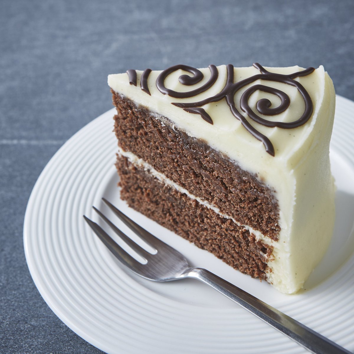 konditorcakes's tweet image. Want a slice of the action? RT by 12pm with your #CakeEmergency &amp;amp; #win a Curly Whirly with our trial 1hr delivery!