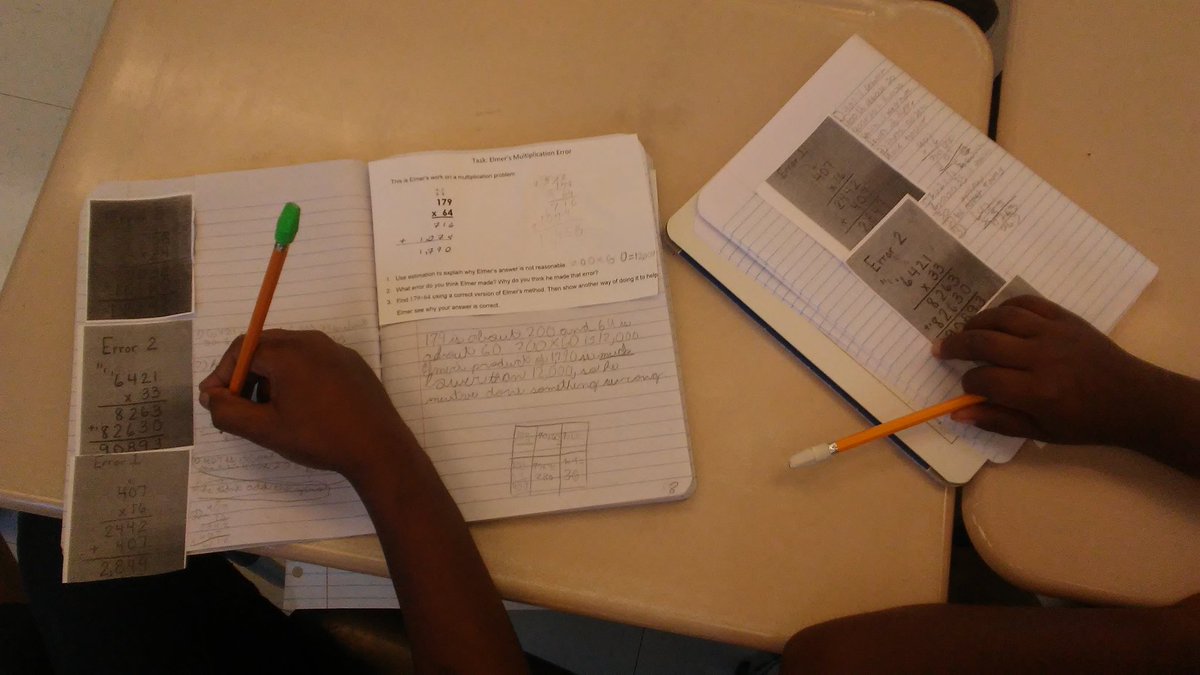 ShapiroLeigh's tweet photo. Students working hard in partners to find the multiplication errors. #ttignite #estimatefirst #standardalgorithm https://t.co/PigxS8N9mP