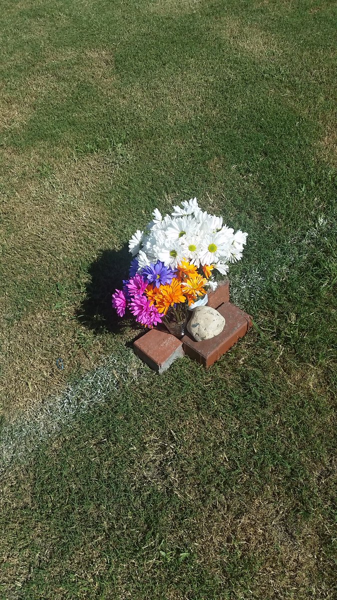 Former Osceola players placed flowers at midfield Sunday in honor of Wilan Harvey. .  <a href="/OHS_Tribe/">The Tribe</a>