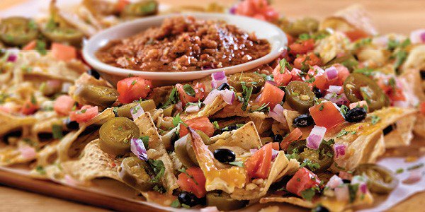 #HappyHour is underway! Join us for $7 #Nachos.  We also have True Pints of our handcrafted beer for only $3.