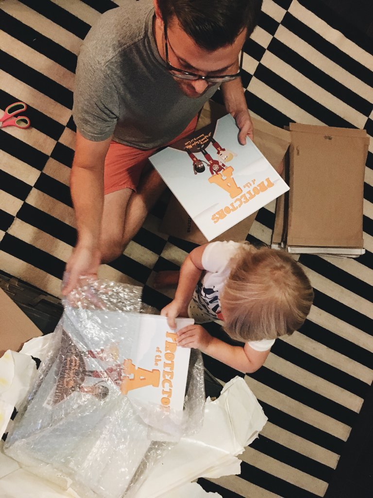 imaprotector's tweet photo. Our little protector helping pack some books for the mail! #godevils #imaprotector #emersonchase #futuresundevils https://t.co/0RaDYOhYPD