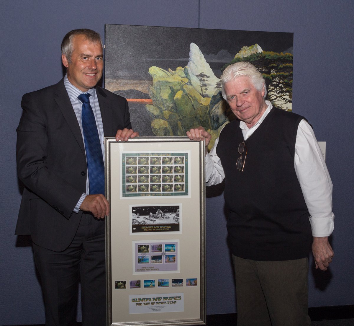 #TBT to our chairman presenting <a href="/_rogerdean/">Roger Dean</a> with a framed set of stamps at the private viewing of his exhibition