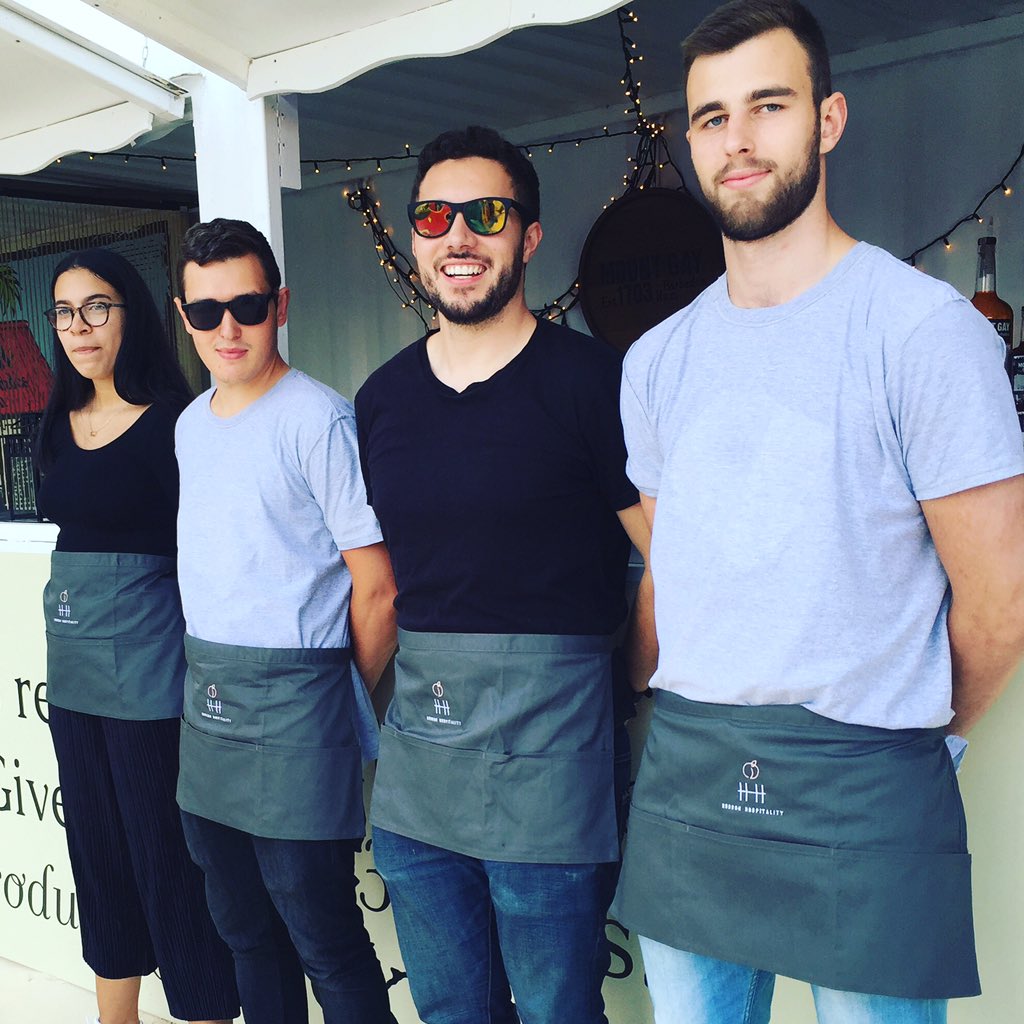 Hudson Hospitality staff loving life in their new aprons! <a href="/HHospitalityLDN/">Hudson Hospitality</a> #servicestaff #hospitality #catering