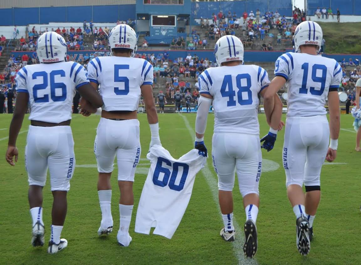 jeharris2's tweet photo. A sobering moment from 0 Week: Mortimer Jordan seniors honor fallen teammate Carson Nolan Thomas (60) at Cordova. https://t.co/d06r3jqcYm
