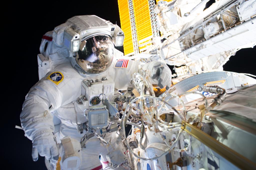NASA's tweet photo. On Friday, @Astro_Jeff, seen here, helped install docking port for @Commercial_Crew flights: https://t.co/e8Vw53rD05 https://t.co/FQeCg6WFAr