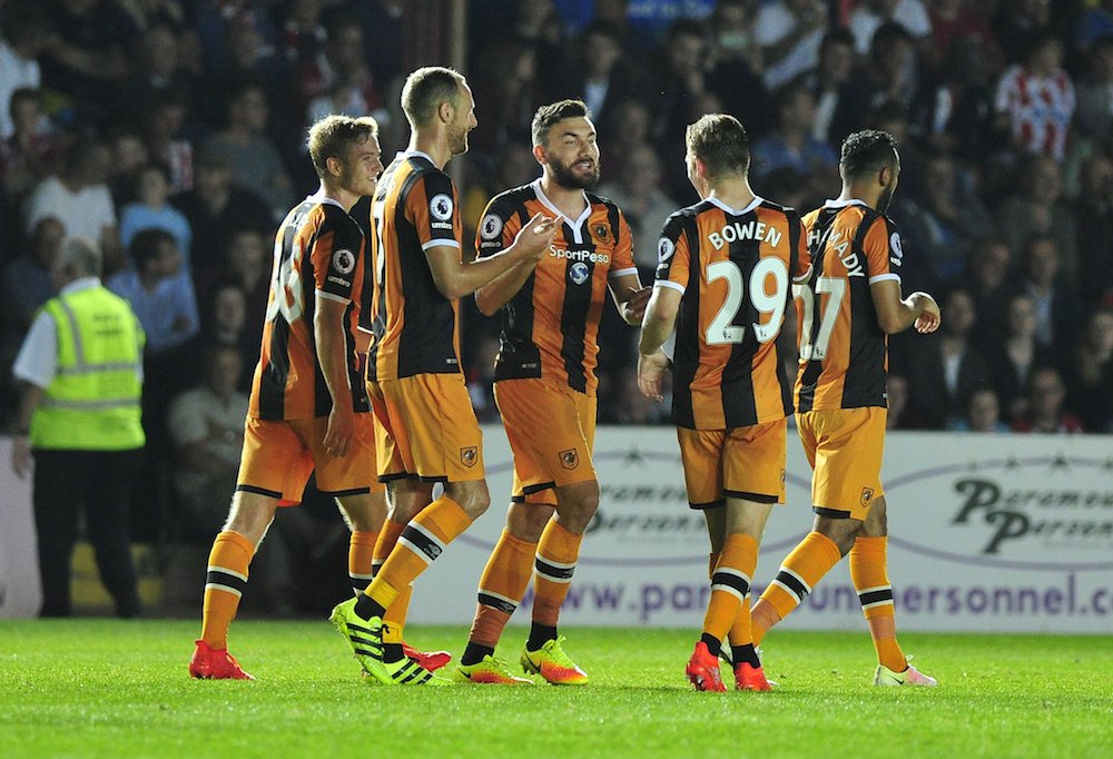 HullCity's tweet photo. 📷 | @robsnodgrass7 is congratulated by his team-mates after scoring @HullCity's third goal of the night #EXEHUL https://t.co/QfHB0xMK6p