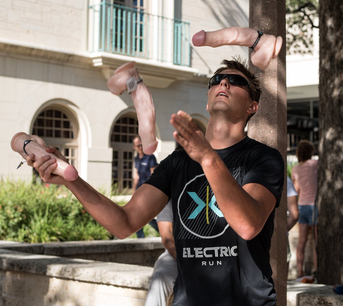 germanglasseye's tweet photo. People are literally juggling dicks on the UT Austin campus right now. #CocksnotGlocks https://t.co/FuaBljUow8