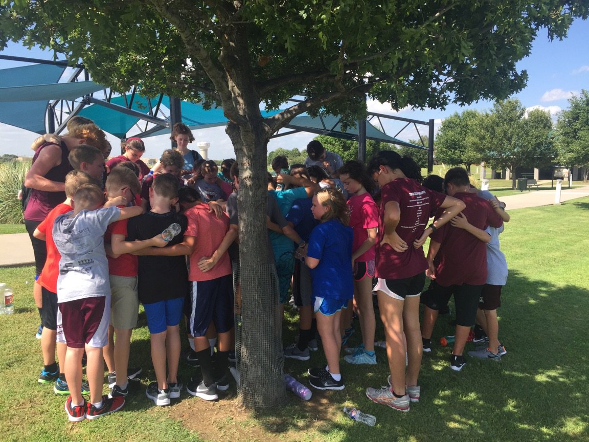 HCAAthletics's tweet photo. AWESOME JOB today to the Saints Elementary Running Club. Nothing like a team prayer to wrap up a good workout! https://t.co/jtuTCv07uW
