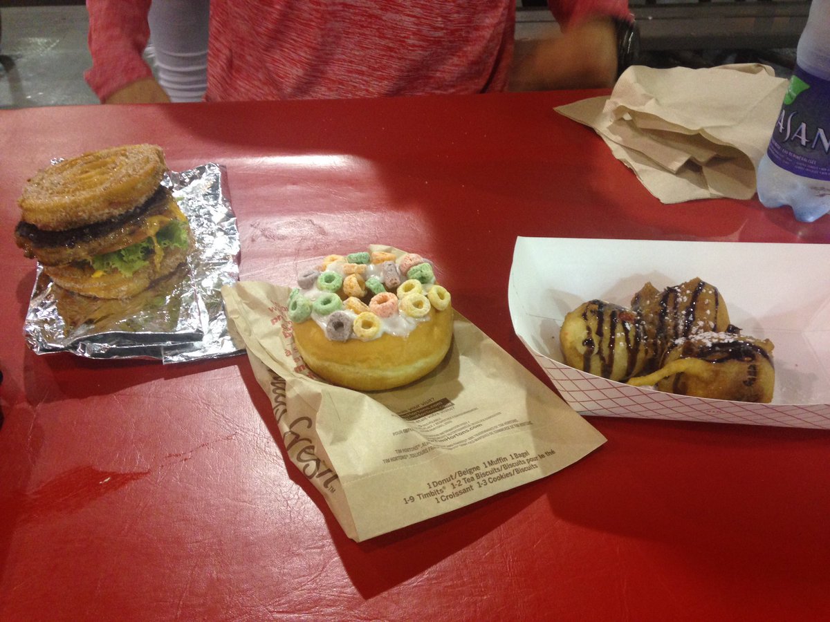 Churro burger, fruit loops doughnut, and fried cookie dough balls...I ❤️ the @LetsGoToTheEX #cnefood #foodporn