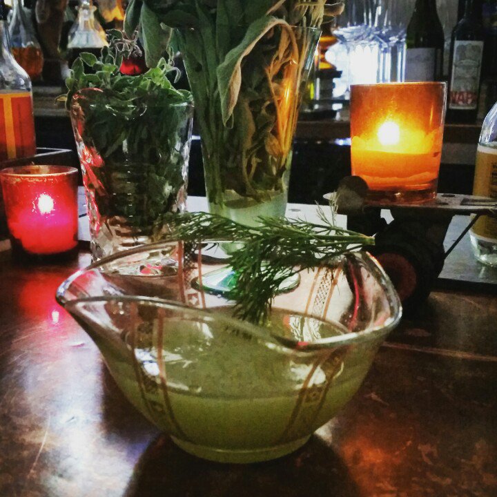 Green Door #cocktail <a href="/loaneworleans/">loa</a> <a href="/ihhotel/">international house</a> mixes green #Chartreuse, Gala apples, dill, sage,served in a jelly bowl