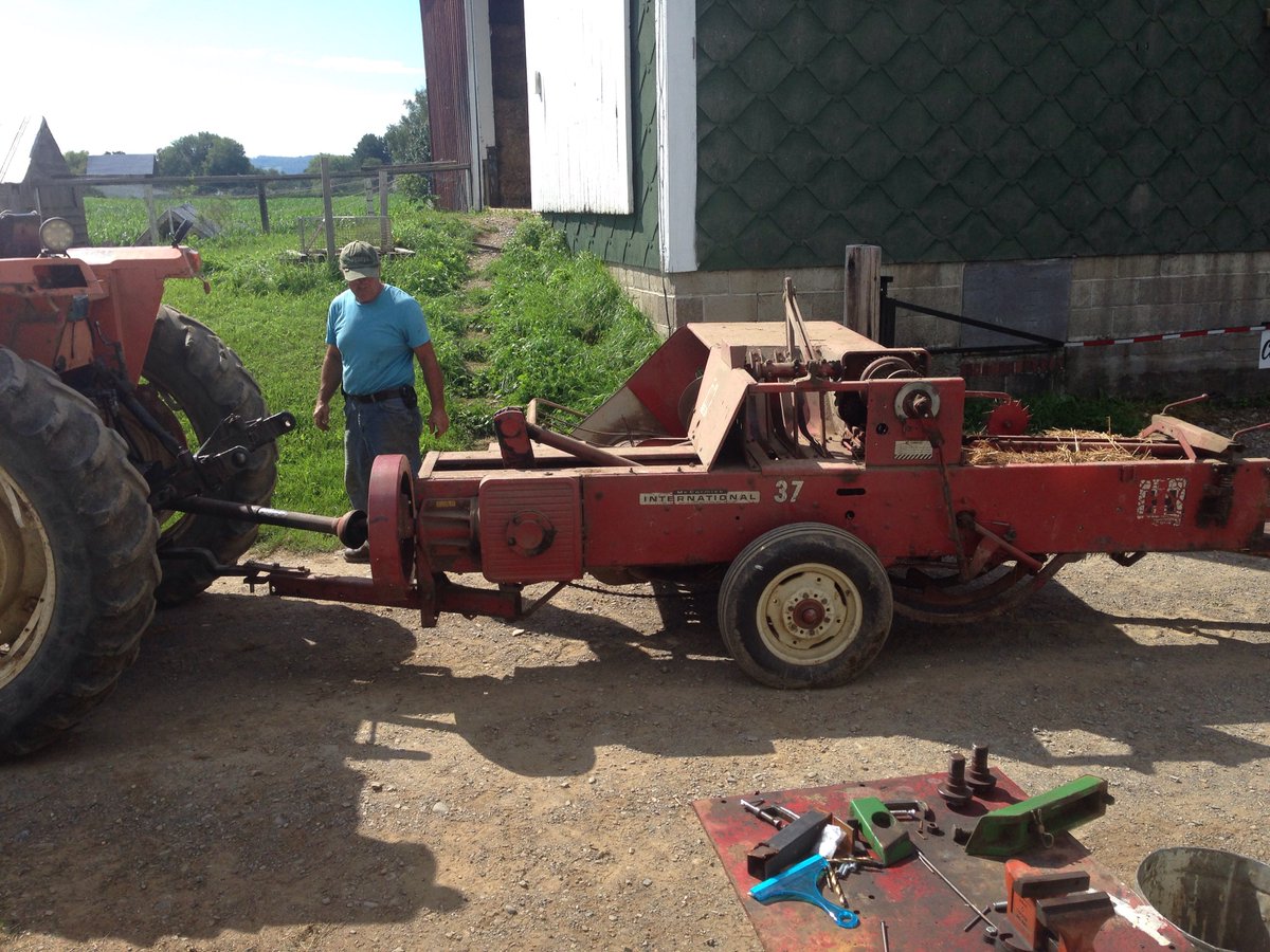 Getting the baler ready to bale straw for all the structures in the Field of Fun