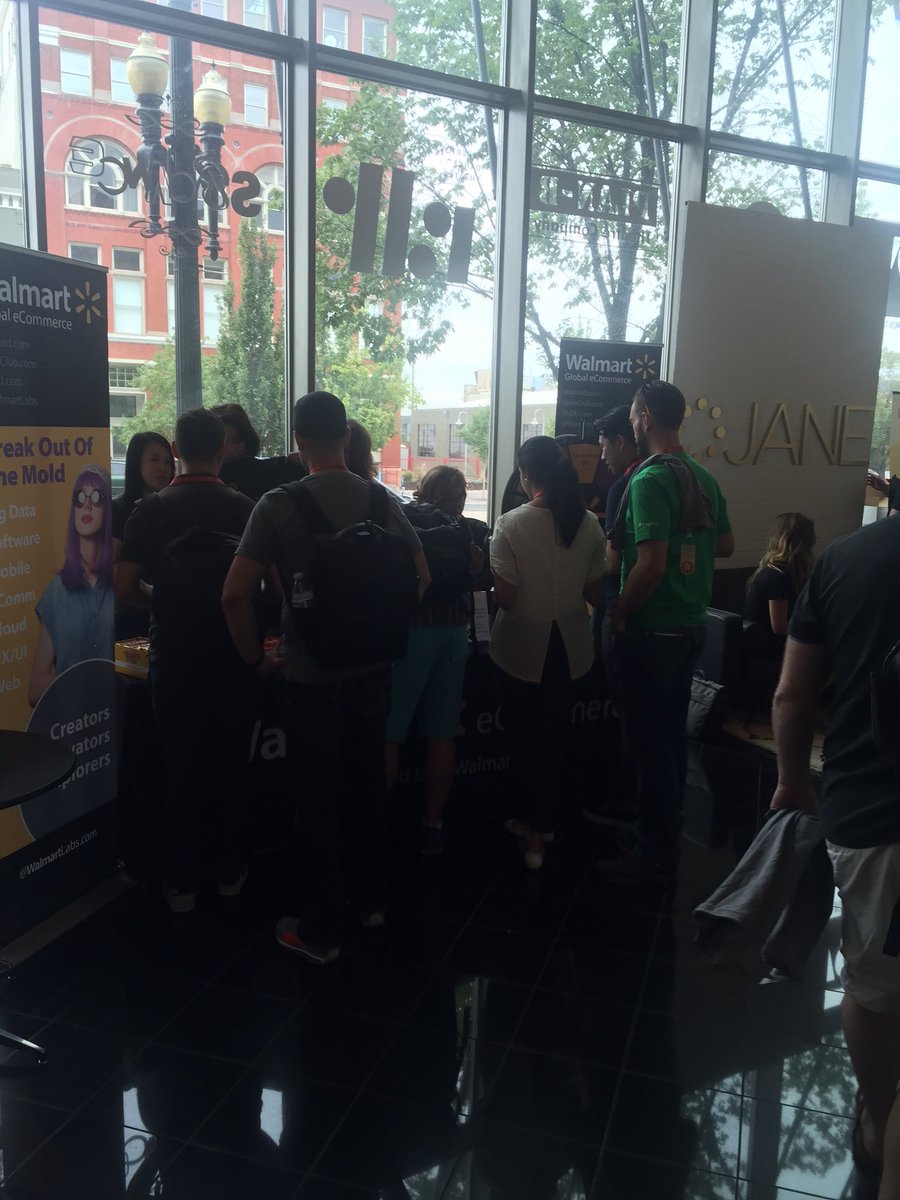 lexgrigoryan's tweet image. The wheel of questions (can&apos;t be seen in pic) is getting a lot of interest in the #WalmartLabs booth at #reactrally