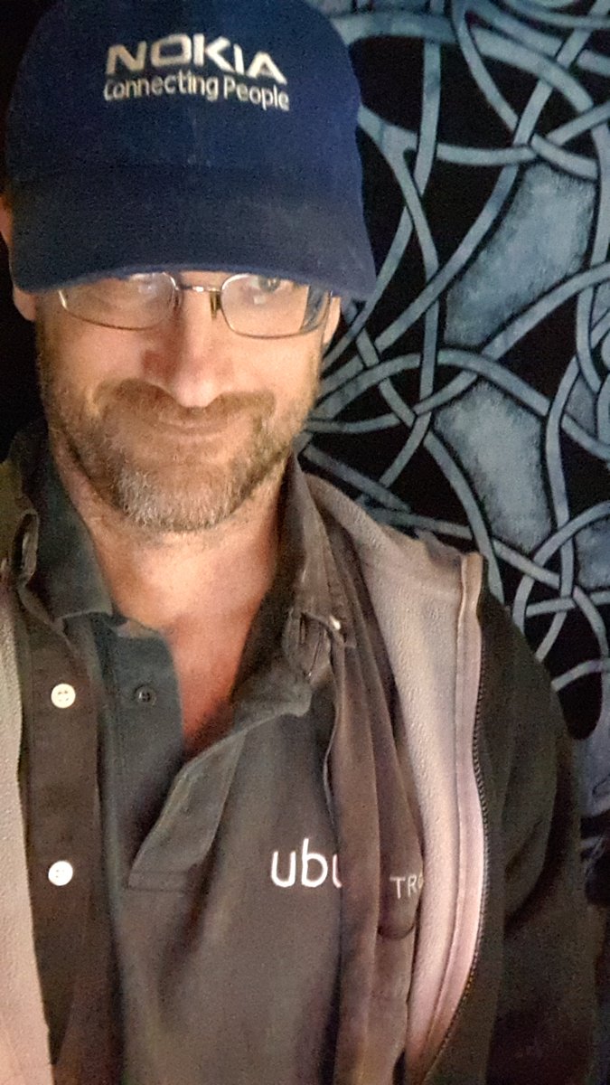 llornkcor's tweet image. Wearing #Ubuntu shirt under #trolltech shirt under #Jolla hoodie under #nokia hat. #fb