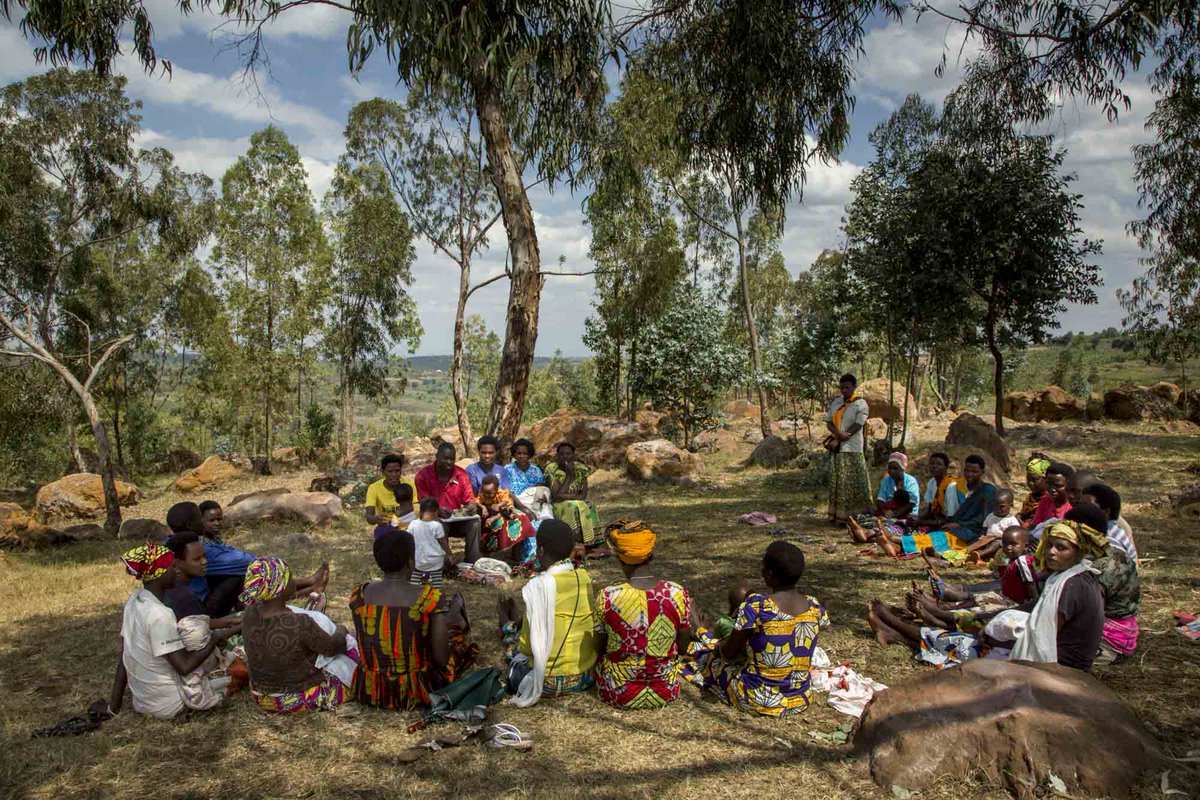 handinhandint's tweet photo. #savinggroup in #Rwanda at work. Not the usual setting for a business meeting. https://t.co/bHS8QPfX89