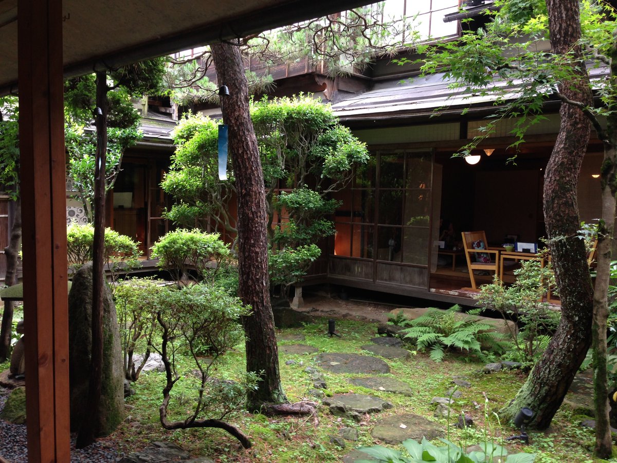 Hiiragi S House Is A Japanese Home Arranged Around A Courtyard And Tree