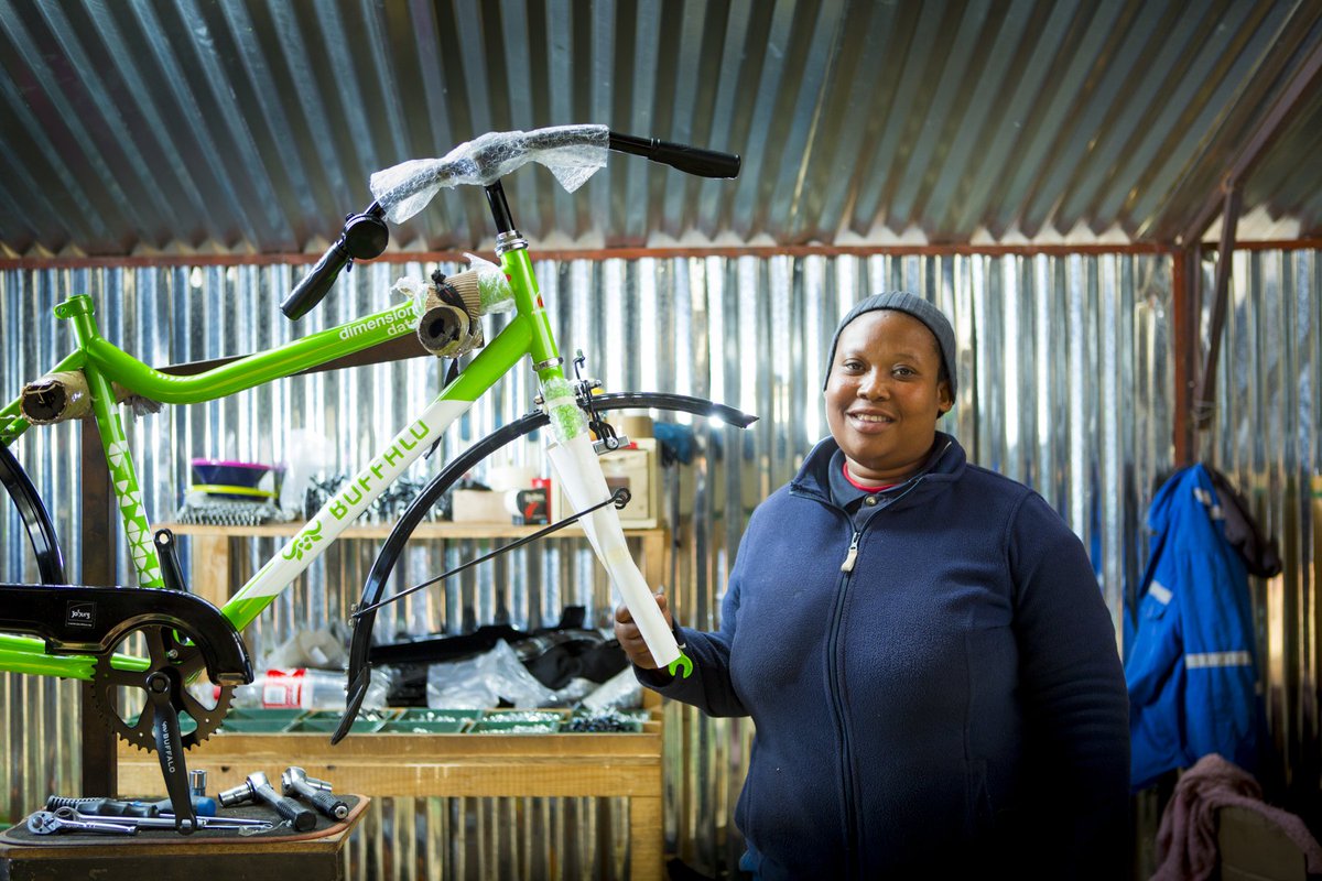 Qhubeka's tweet image. We strengthen the local economy and promote long-term sustainability by assembling Qhubeka bicycles in South Africa.
