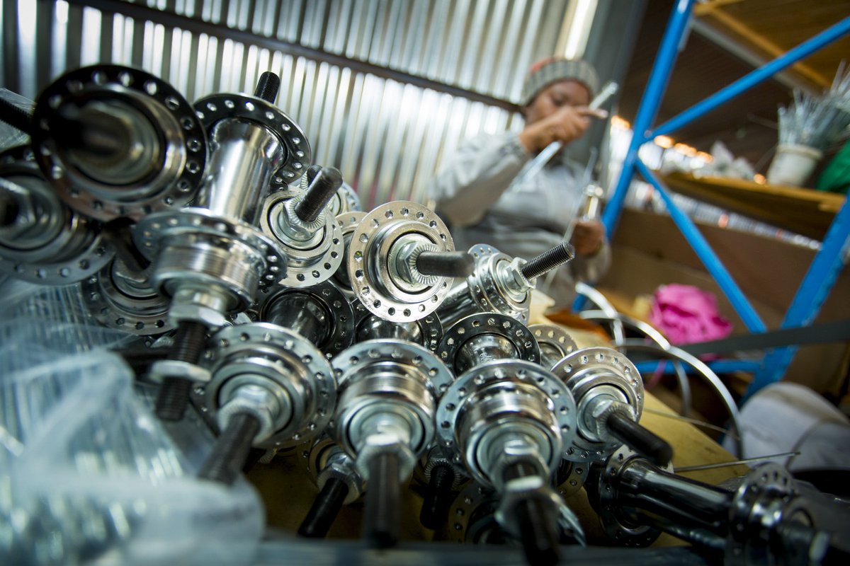 Qhubeka's tweet image. We strengthen the local economy and promote long-term sustainability by assembling Qhubeka bicycles in South Africa.
