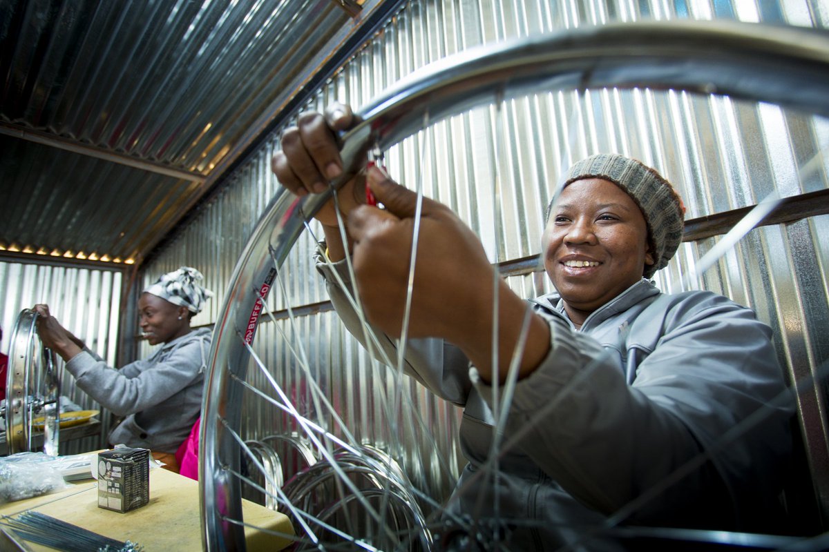 Qhubeka's tweet image. We strengthen the local economy and promote long-term sustainability by assembling Qhubeka bicycles in South Africa.