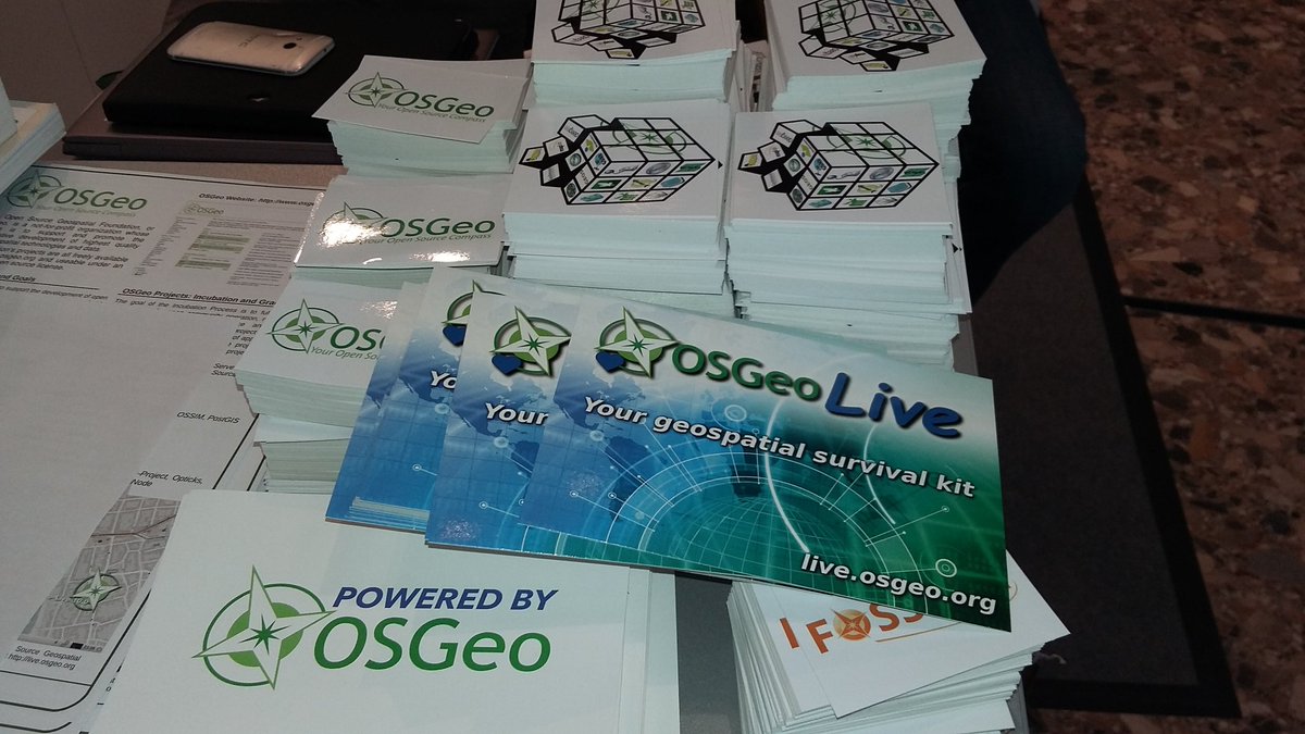 OSGeo's tweet image. Take #OSGeo home to your country. Take many stickers &amp;amp; postcards from @OSGeo booth please. #FOSS4G2016
