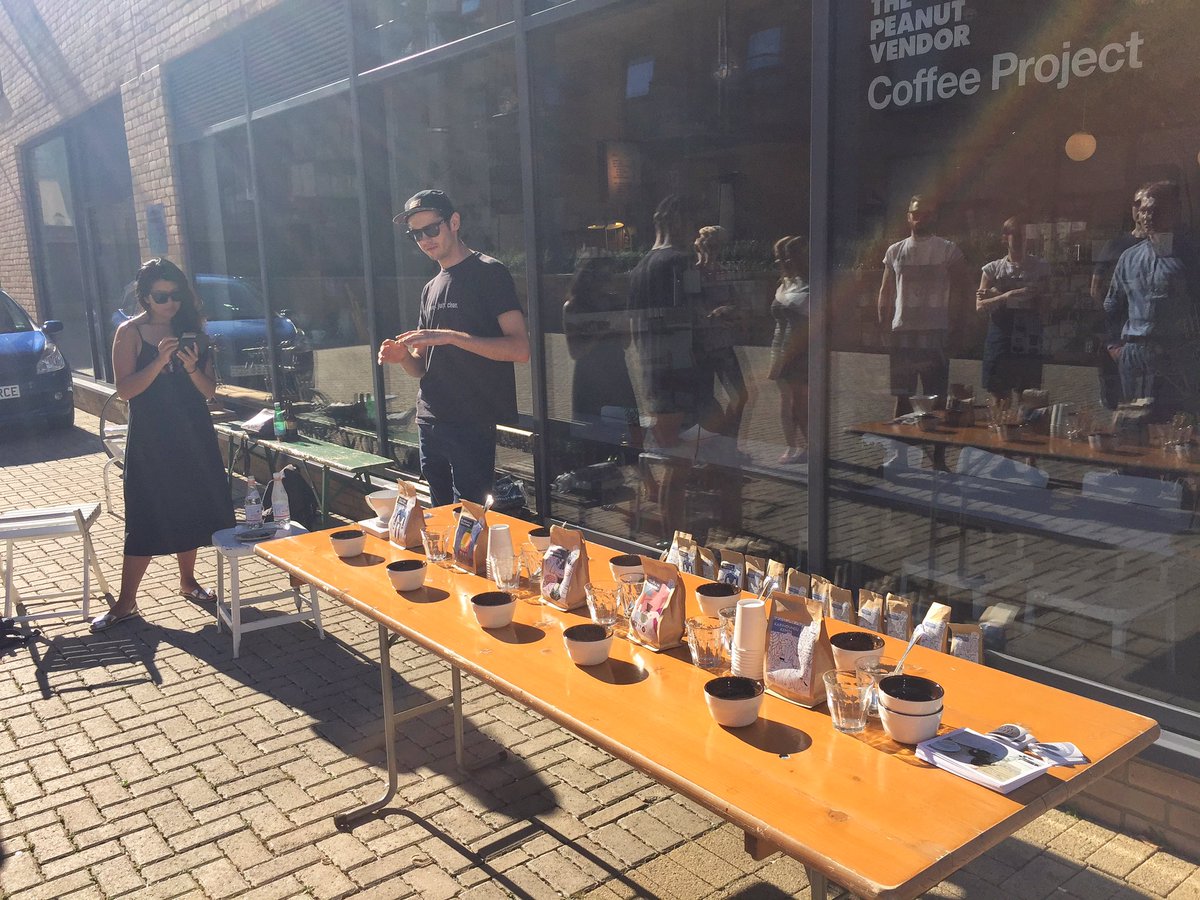 BestCoffeeApp's tweet photo. Great outdoor cupping @ThePeanutVendor w @piotrcoffee et al tasting lovely coffees roasted by Java in Warsaw https://t.co/AiYksMZ5RW
