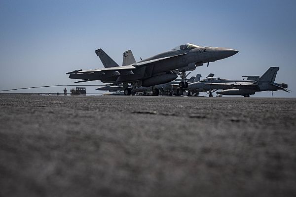 A #VFA86 F/A-18E Super Hornet makes an arrested landing on the flight deck of the aircraft carrier @TheCVN69