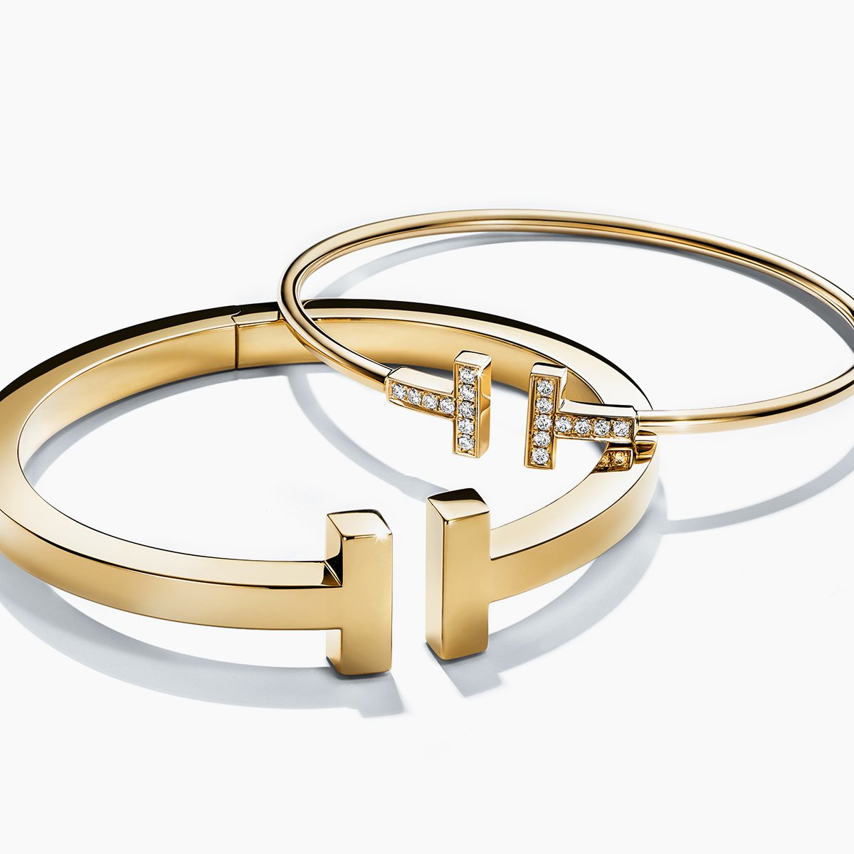 #tiffanyt designs—like this 18k gold tiffany t square bracelet and wire bracelet ...