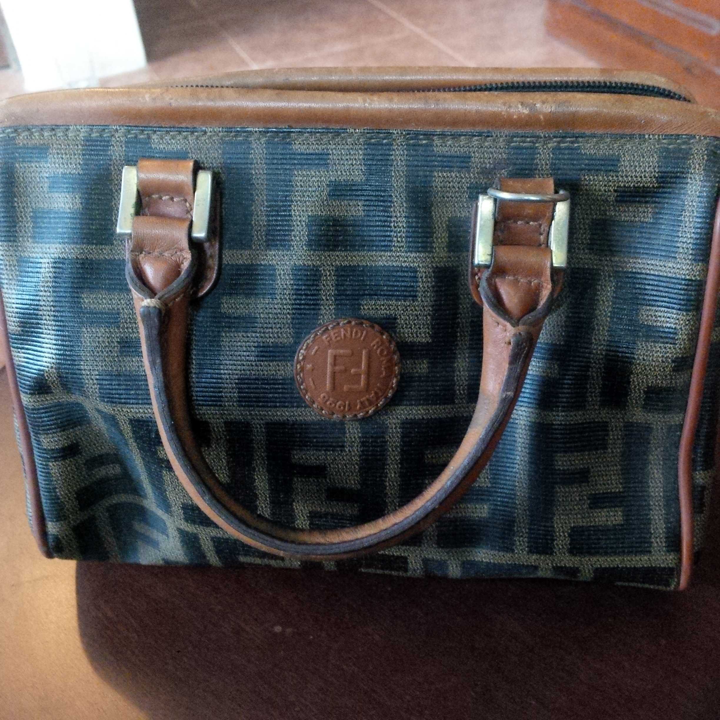 Molara Wood on X: Vintage. My tiny old Fendi bag, purchased for