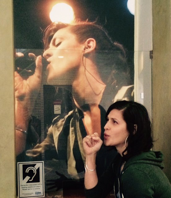 Dessa goofing around with her banner at The O'Shaughnessy Ticket Office before tonight's show.