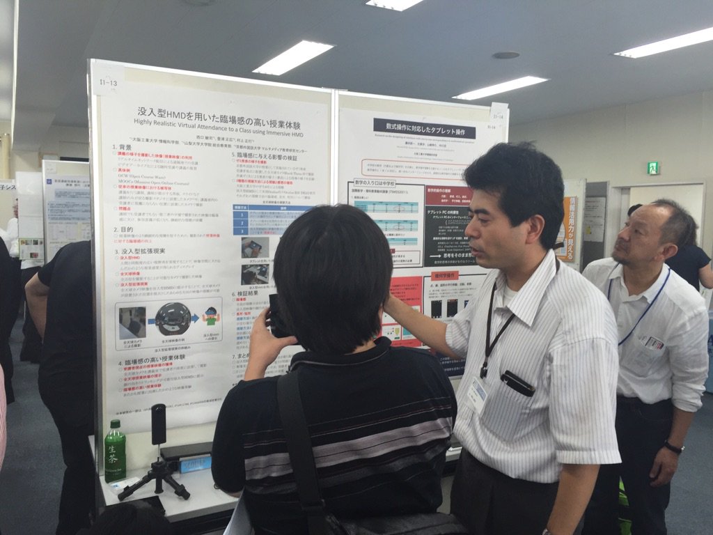 munyon74's tweet photo. 西口さん@大阪工業大が発表していますー。
I1-13　西口敏司、豊浦正広、村上正行「没入型HMDを用いた臨場感の高い授業体験」 #jsise2016 https://t.co/6nfFmnw4P3