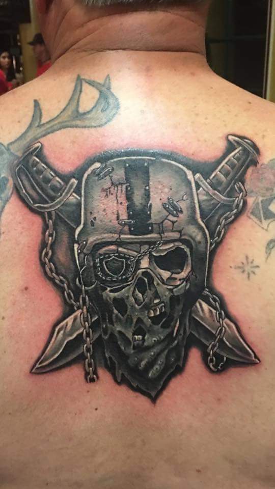 Raiders skull rose  Skull tattoos Skull tattoo design Skull tattoo