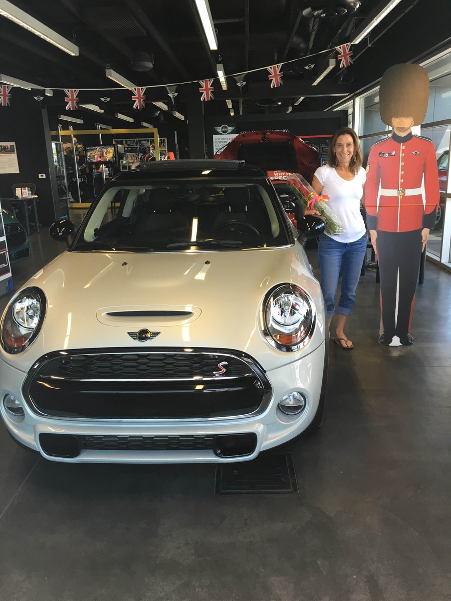 TucsonMINISvc's tweet photo. Tina Hernandez posing with one of #RoyalMinis Royal Guards next to her new 2016 #MINICooper Hardtop Sport! https://t.co/OzBO12JJcW