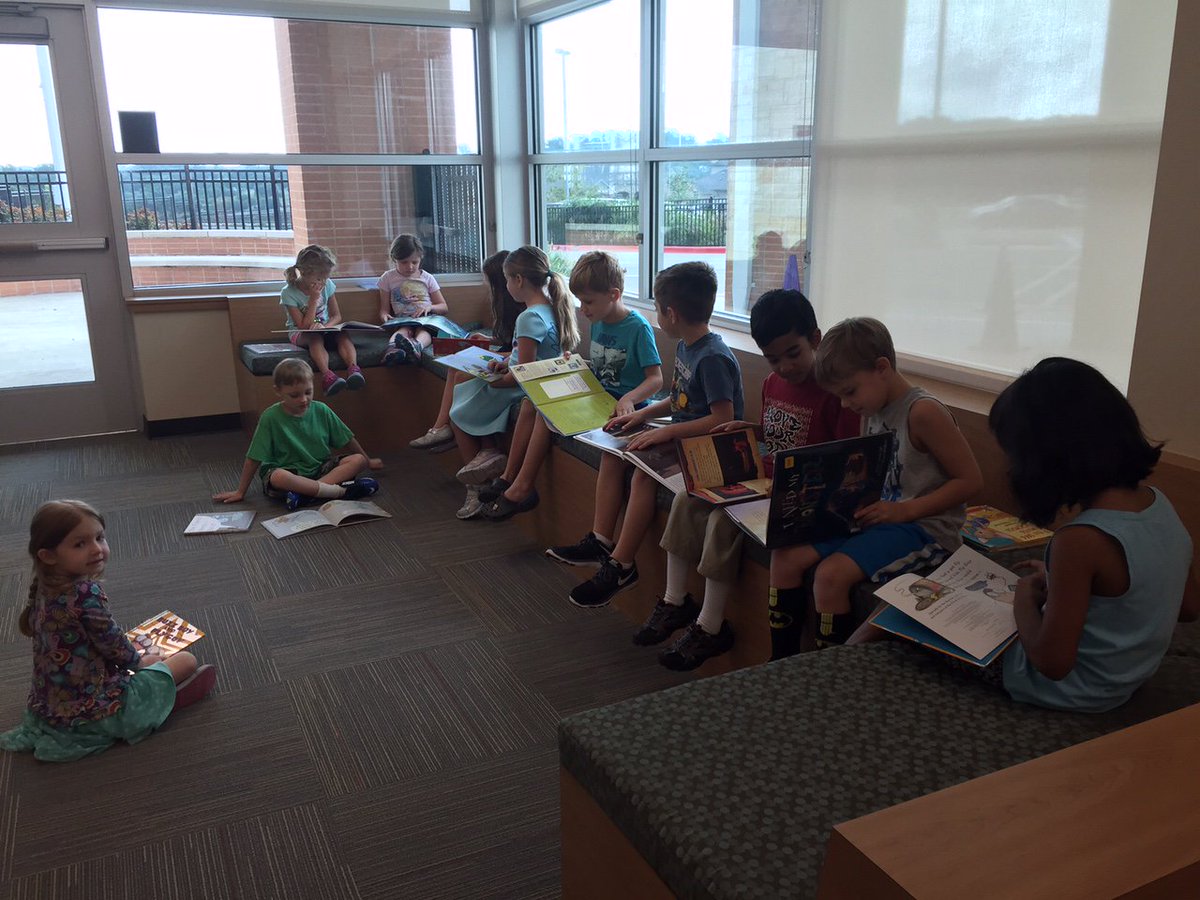 What a beautiful sight: Ms. Jenkerson's class reading books in the library! These kids love books!