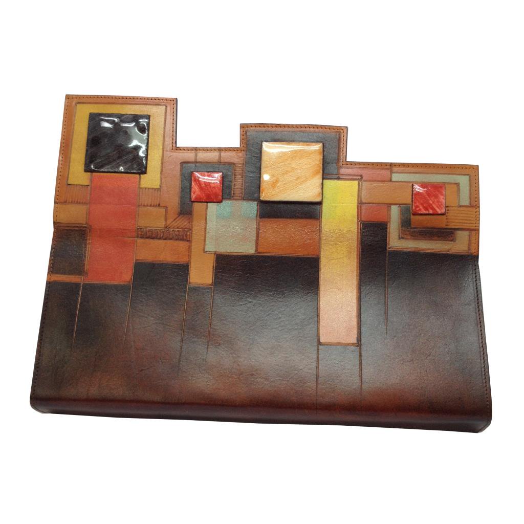 BottegaMida's tweet image. #borsabaguette dai toni caldi, decorazioni geometriche e inserti di pietra lavica #singleone
midapelletteria.it/baguette-3413-…