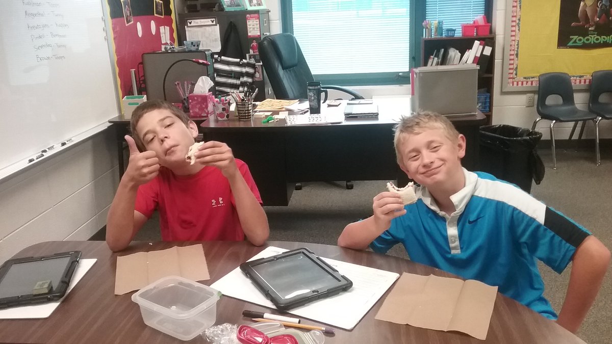 Finally, enjoying our butter and jelly sandwiches after sequencing the steps to make them!