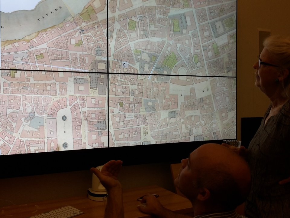 schelbertgeorg's tweet image. browsing through different digital maps of Rome on a big screen at CESTA Stanford #mappingrome