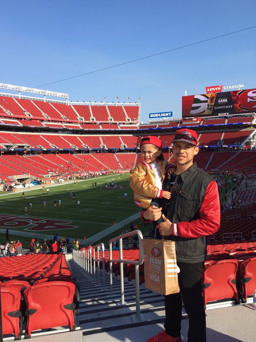 wemboski49's tweet image. Game day ritual...my son and I always ready and representing. Our picture at the esurance booth #SuiteSquadContest