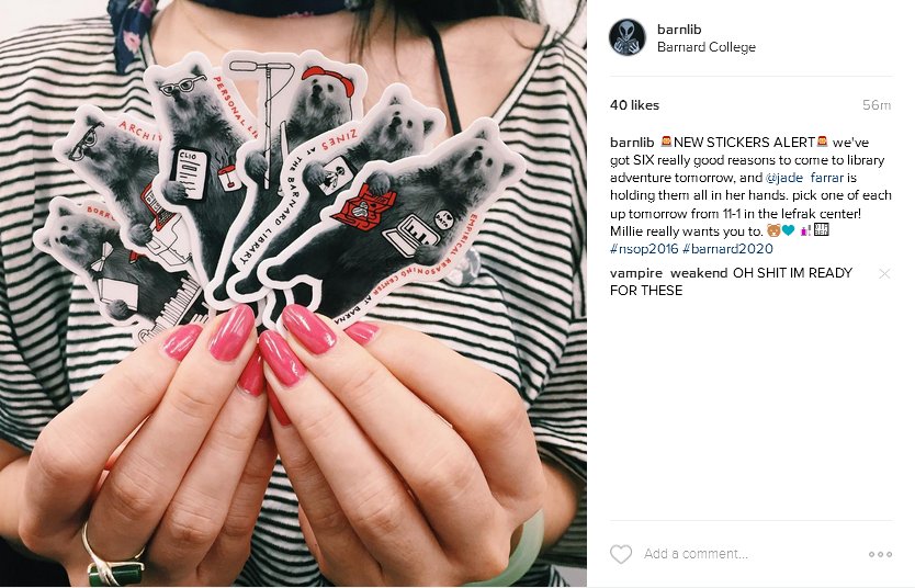 person wearing red nail polish holding a set of six bear stickers