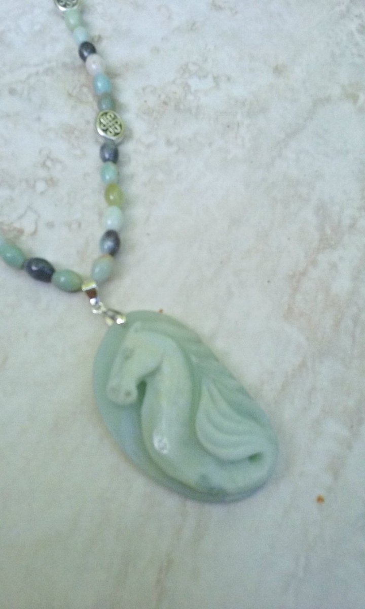 DebWiseCreation's tweet photo. Aqua Blue Celtic Kelpie Necklace https://t.co/t7vUsdU72m #Etsyfru #FruHeartAttack https://t.co/EVdvaROtQo
