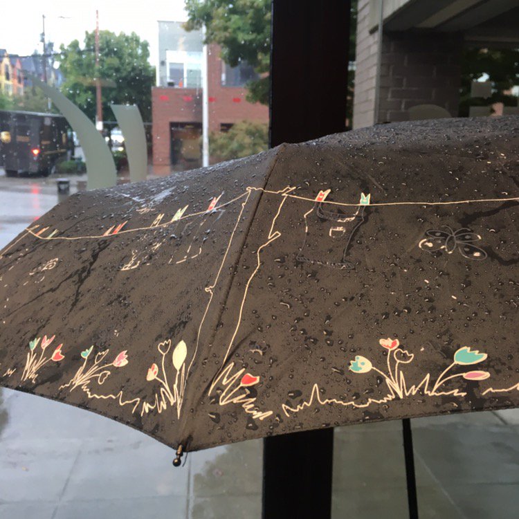 kotisdesign's tweet photo. A rainy day in Seattle is the perfect reminder to start thinking about #CustomUmbrellas https://t.co/J7n81I030R