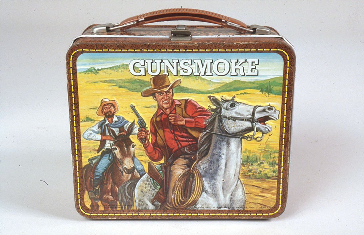 amhistorymuseum's tweet photo. Today in 1955: The TV series "Gunsmoke" premieres on CBS. It ran for 20 years. 1959 "Gunsmoke" lunchbox: https://t.co/i7wD9GignP
