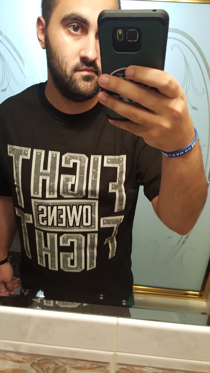 sittingringside's tweet image. Got on my new @FightOwensFight shirt, and I love it! Can't wait to see what he has to say on Monday's #Raw #WWE