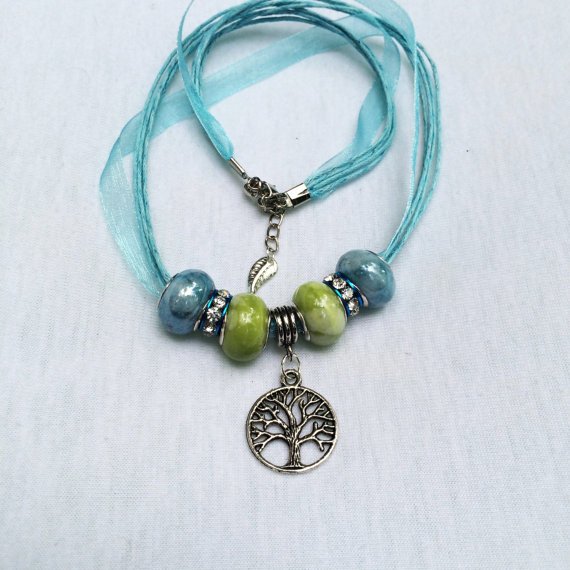 TwistedTreeLife's tweet photo. Tree of Life Pendant with Aqua Blue and Green Blend Glass.. https://t.co/O8aMzt1TdI #treeoflife #wirewrappedtree https://t.co/FxqyNWzQtg